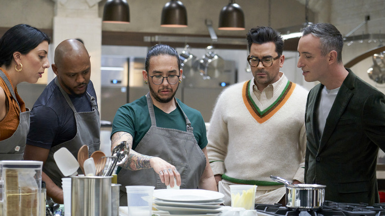 Chef Danielle Sepsy, Chef Antwon Brinson, Chef Roman Wilcox, Dan Levy, and Will Guidara in kitchen