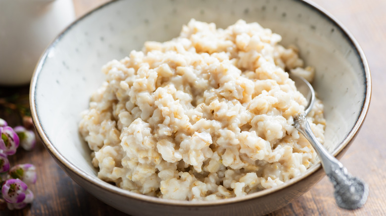 Bowl of oatmeal with spoon