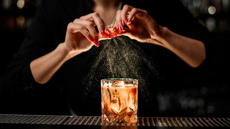 Bartender making old fashioned