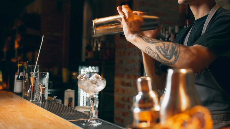 Bartender making cocktail