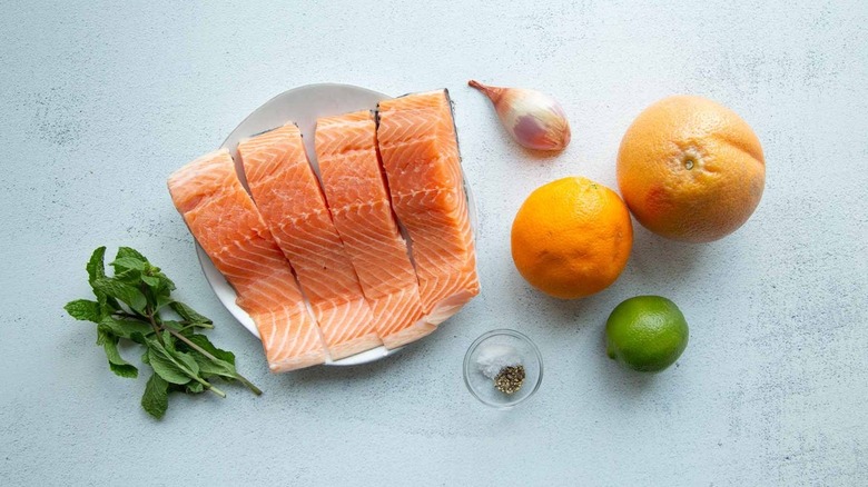 raw salmon and citrus fruits