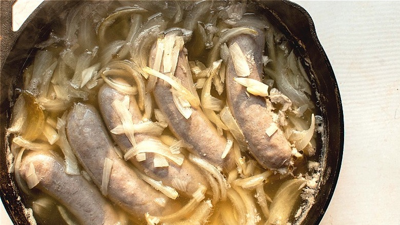 cooked bratwursts in beer