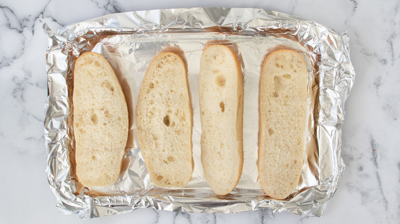 hoagies on foil-lined pan