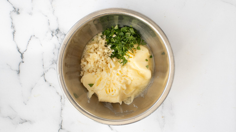 butter garlic parsley in bowl