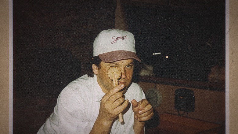 young Wolfgang Puck wearing a Spago hat