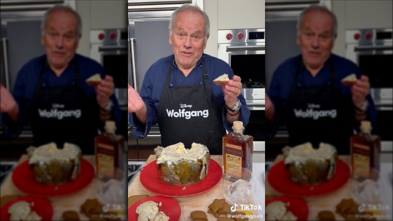 Wolfgang Puck puts blue cheese on gingerbread cookie