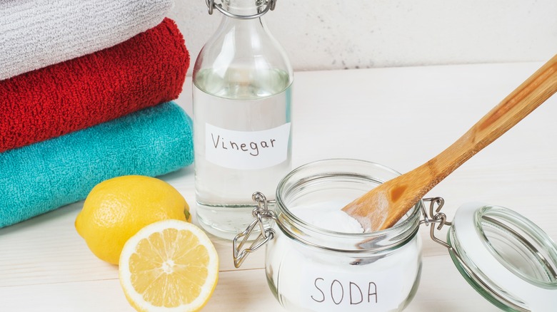 wood spoon in baking soda