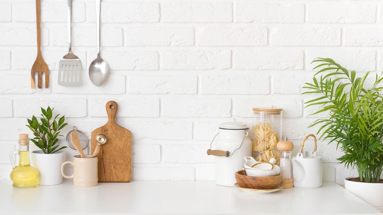 kitchen counter with wood utensils