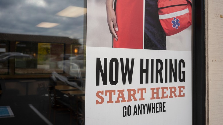 hiring sign in Arby's window