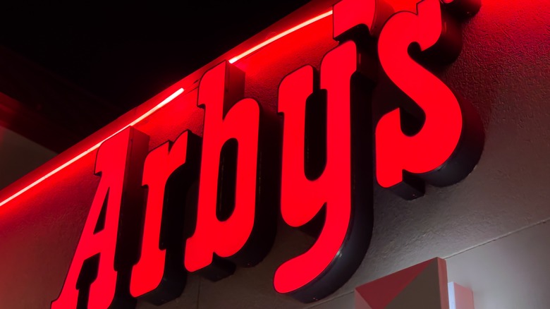 close up of neon Arby's sign