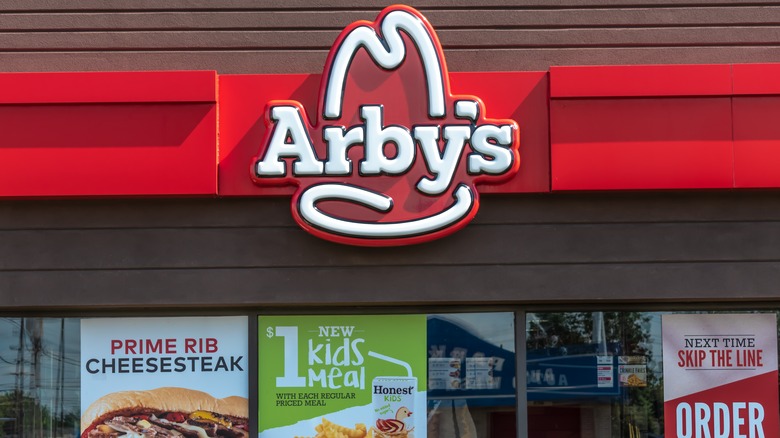 Arby's window with signs