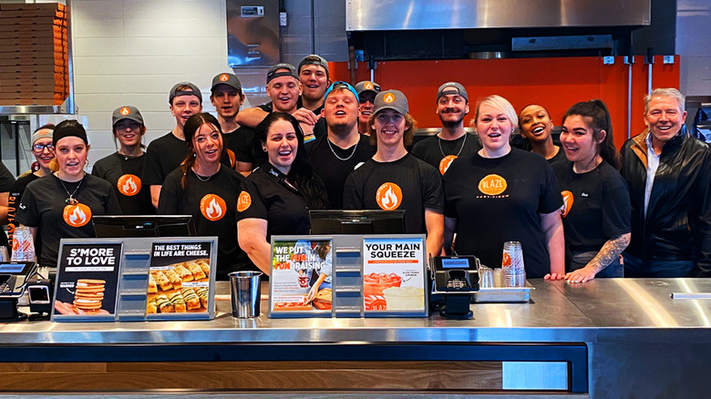 Restaurant workers smiling