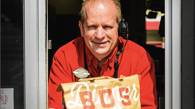 smiling drive thru employee