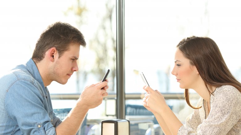 couple on phones