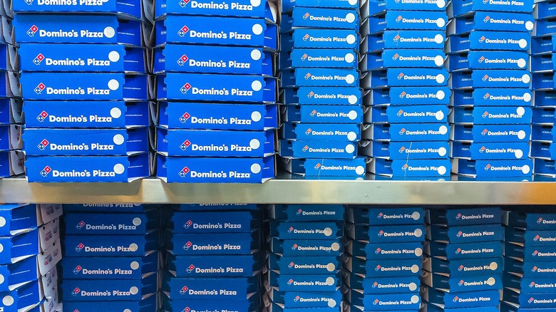 Stacks of pizza boxes