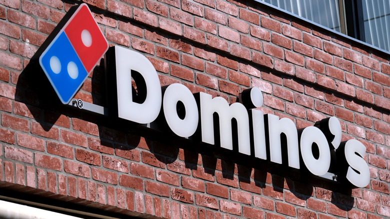 Domino's sign in the daytime