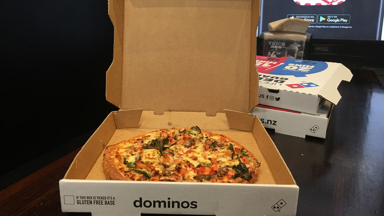 Open box of Domino's pizza