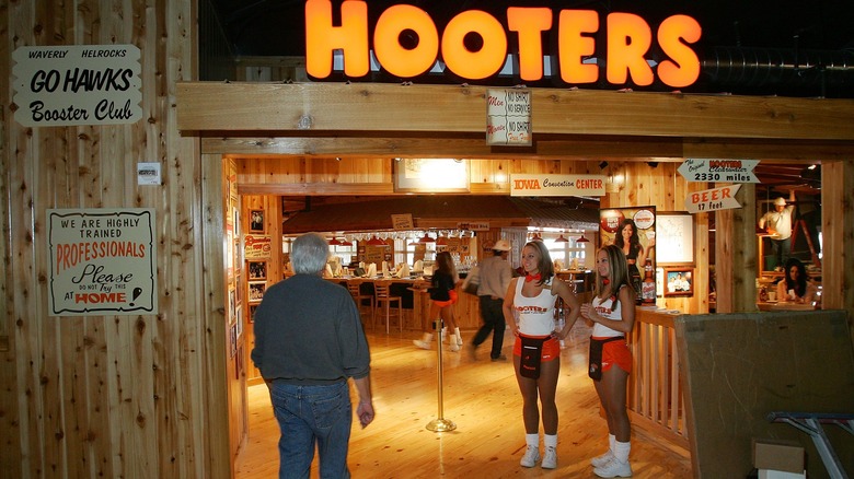 hooters girls welcoming customers