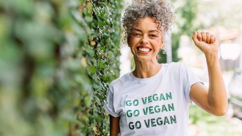 Woman in go vegan T-shirt