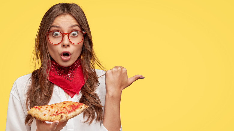 A woman having Jet's Pizza