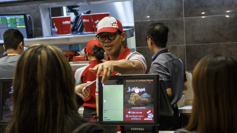 Jollibee employee behind counter