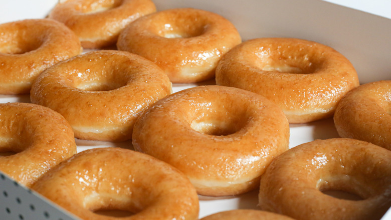 Dozen glazed doughnuts in box