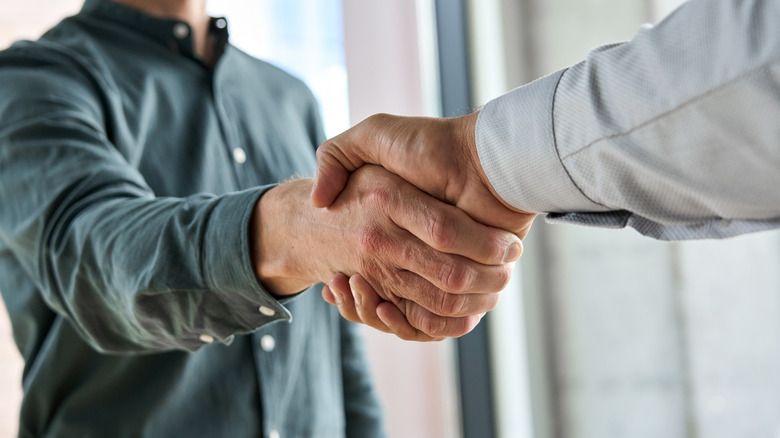 men shaking hands