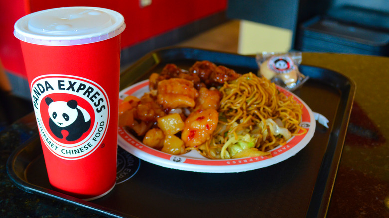 tray of Panda Express food and a cup