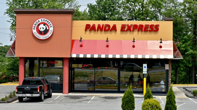 Panda Express building with trees behind it