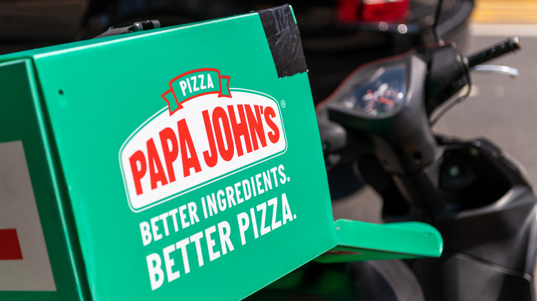 Papa John's delivery box on a motorcycle