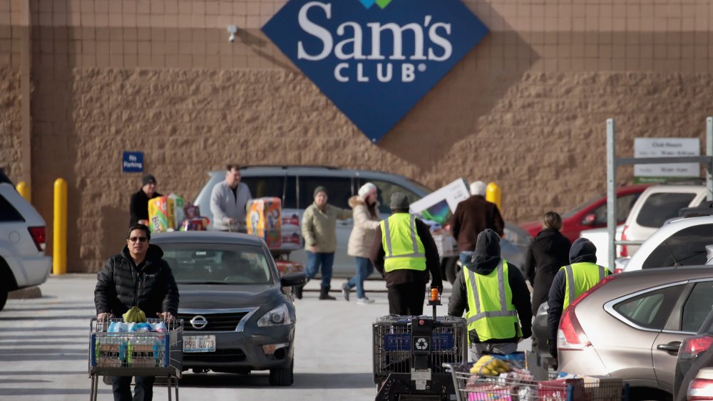 sam's club workers collecting carts