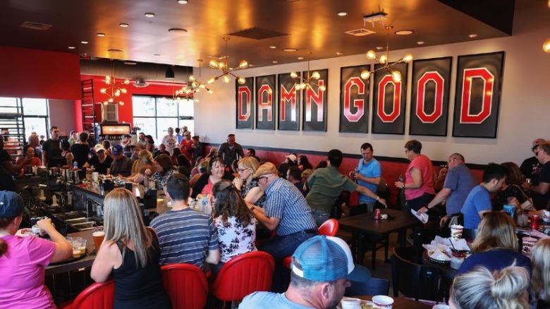 Crowded Torchy's Tacos restaurant interior