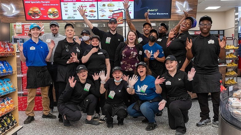 Crowd of Wawa employees smiling