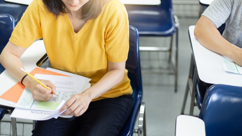 Woman studying taking test