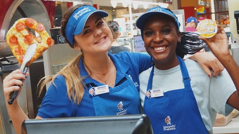 Wetzel's Pretzels employees behind counter