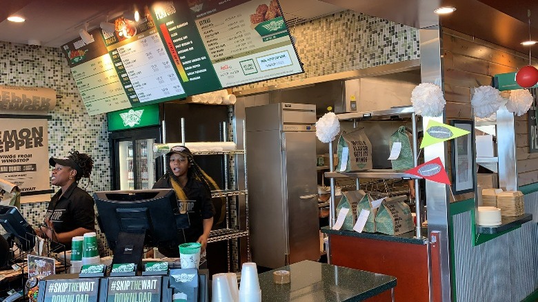 Wingstop employees working in restaurant