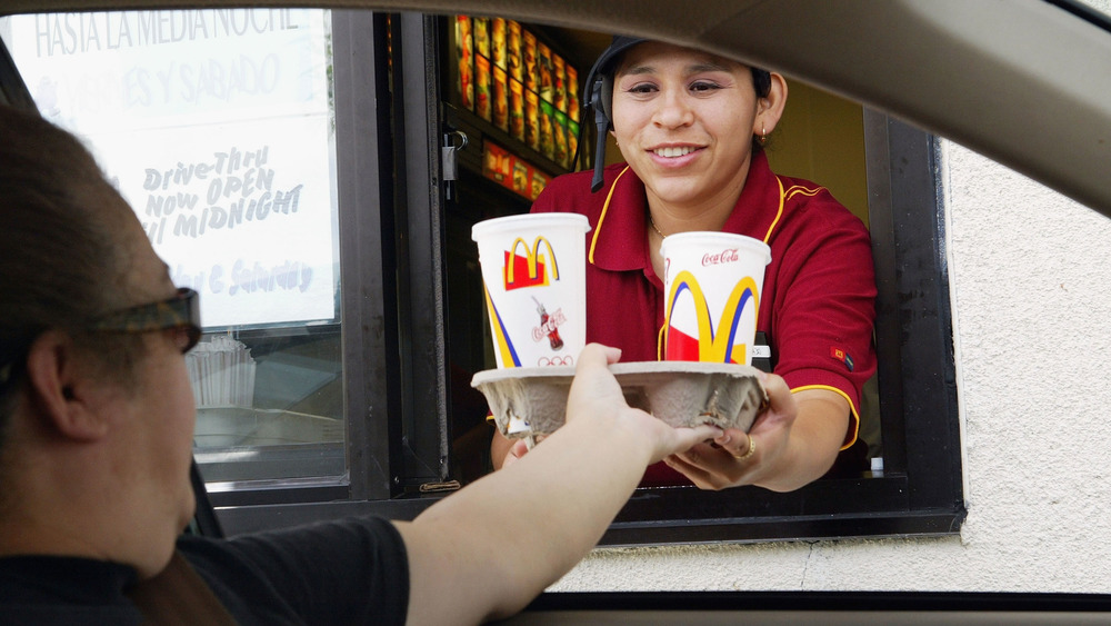 mcdonald's drive thru employee and customer drinks