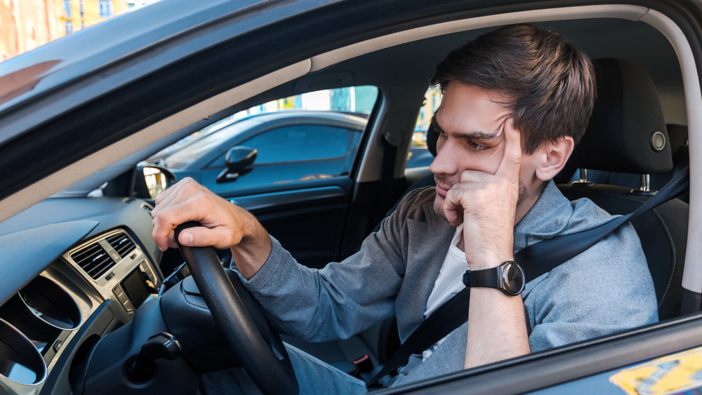 Angry person in car