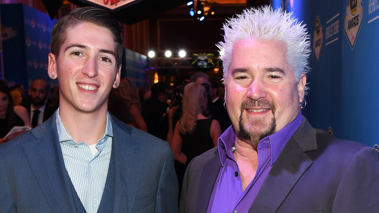 Guy Fieri posing with his son, Hunter