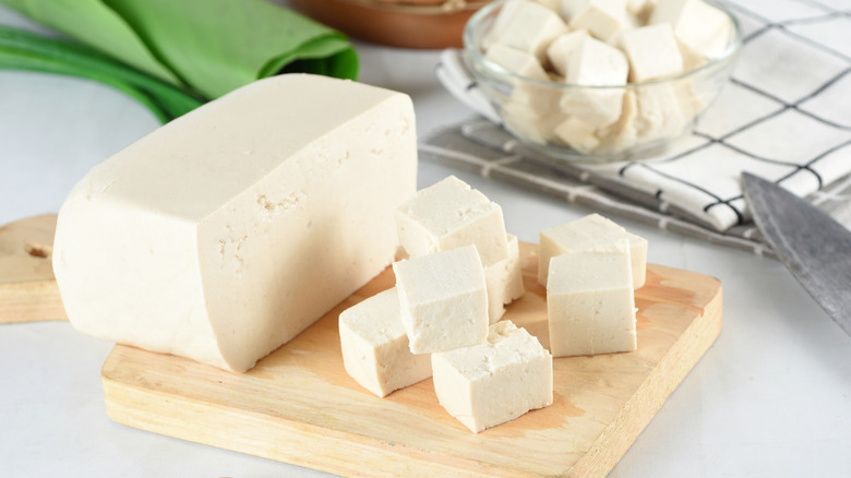 Tofu on wood cutting block