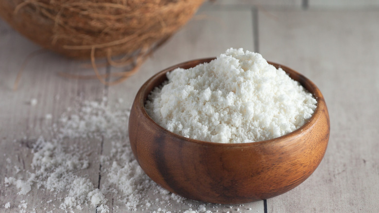 Coconut milk powder in a wooden bowl