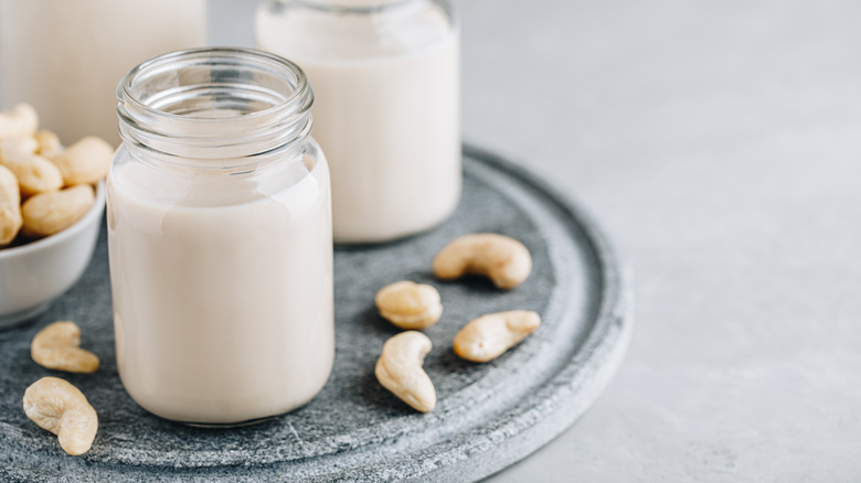 Jars of milk with cashews 