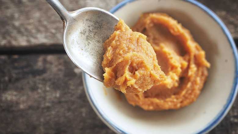 Miso paste in spoon and bowl