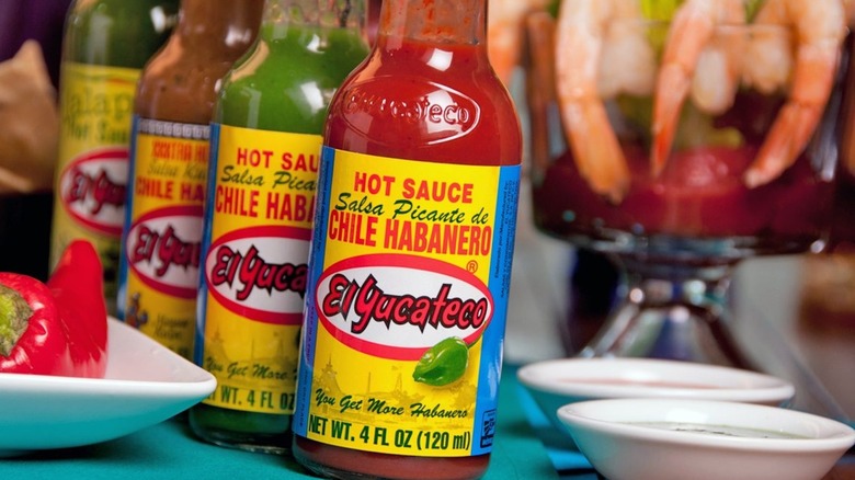 Bottles of El Yucateco Habanero Hot Sauce