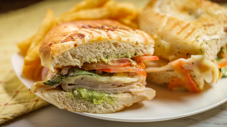 Turkey Sandwich with chips on plate