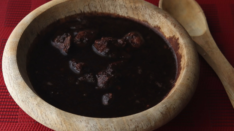 A bowl of black broth