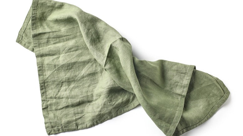A green cloth napkin