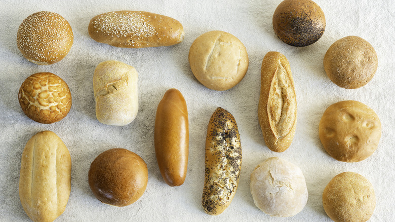 overhead shot of a variety of types of bread rolls used for sandwiches