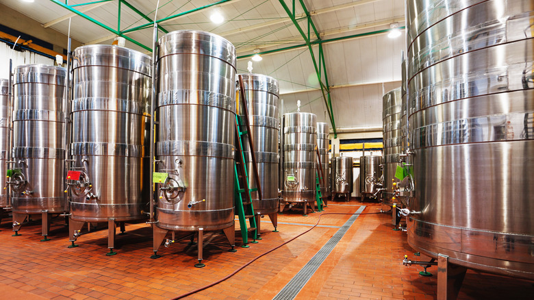 wine fermenting tanks in winery