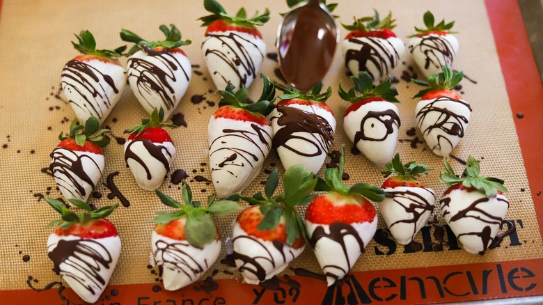 chocolate strawberries on baking sheet 